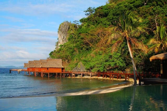 Water Villa with Free Roundtrip Lio Airport Transfers