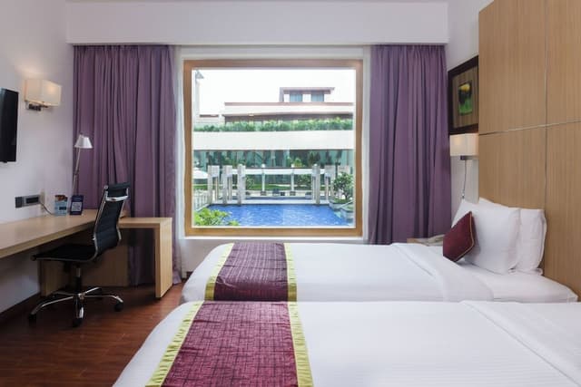 Premier Twin Beds with Pool View and Lounge Access - Happy Hours 6:30 PM to 8:30 PM