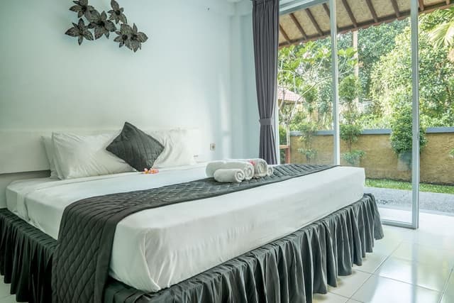Deluxe Double Room, 3 Bedrooms, Balcony, Garden View