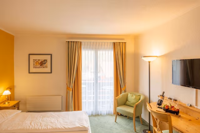 Double room mountain side with balcony