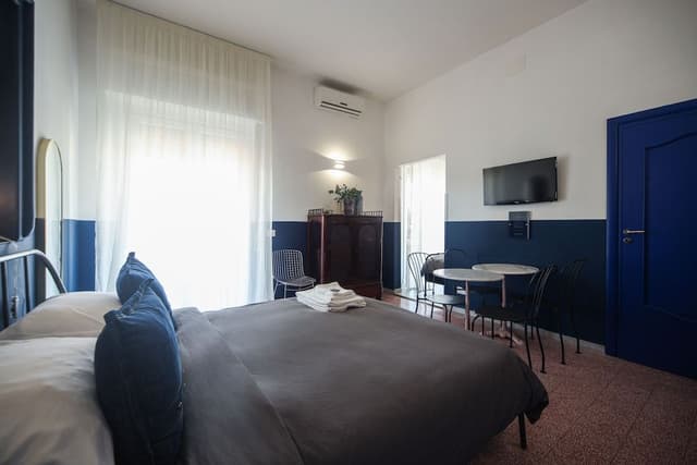 Deluxe Quadruple Room, Private Bathroom