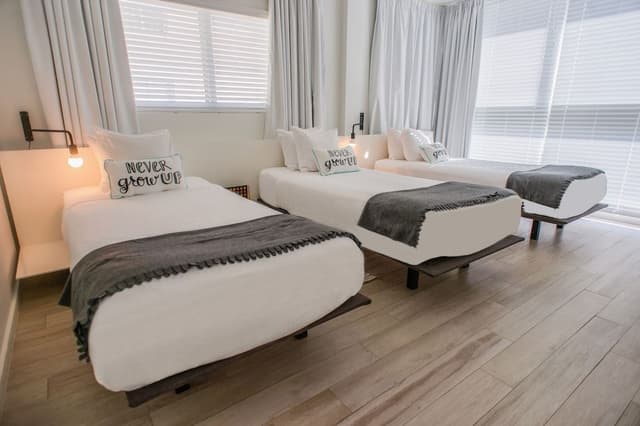 2 Bedrooms: One King, Three Twins