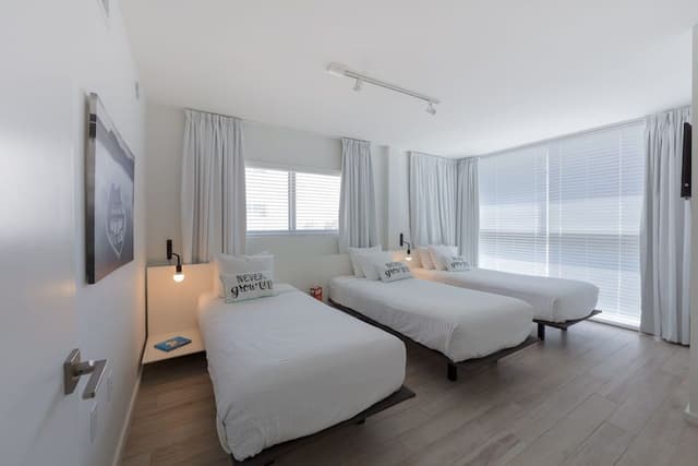 2 Bedrooms: One King, Three Twins