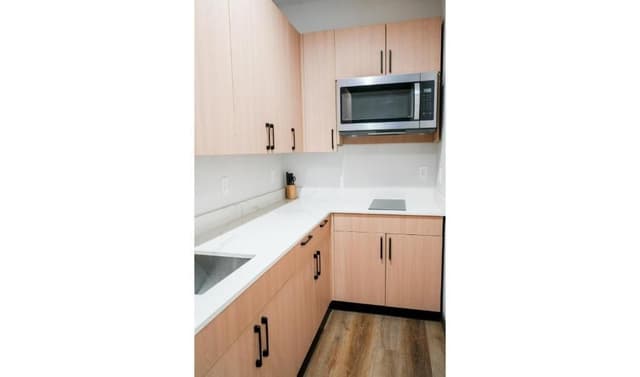 Premium Kitchenette Room with Two Queen Beds and Balcony