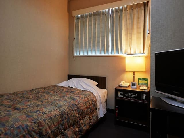 Economy Single Room, 1 Twin Bed, Smoking, City View