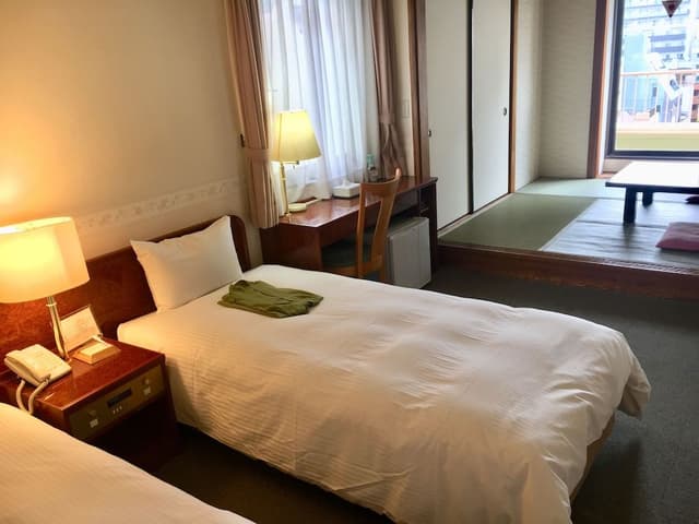 Japanese Western Room 7th floor, 2 Bed, Futon from 3rd person(go up the stairs from 6th floor)