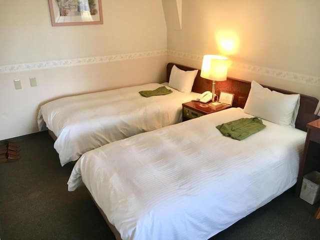 Japanese Western Room 7th floor, 2 Bed, Futon from 3rd person(go up the stairs from 6th floor)