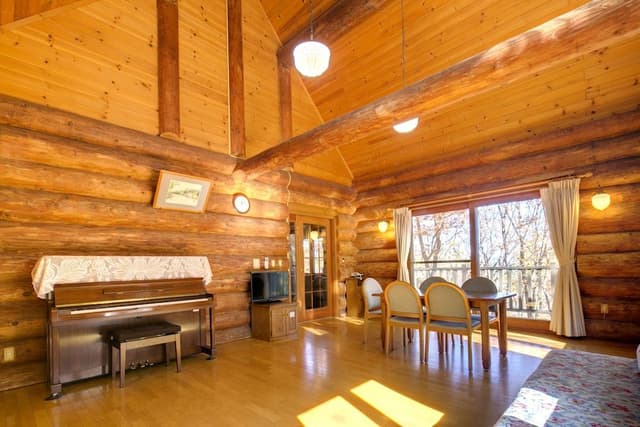Log House with Piano