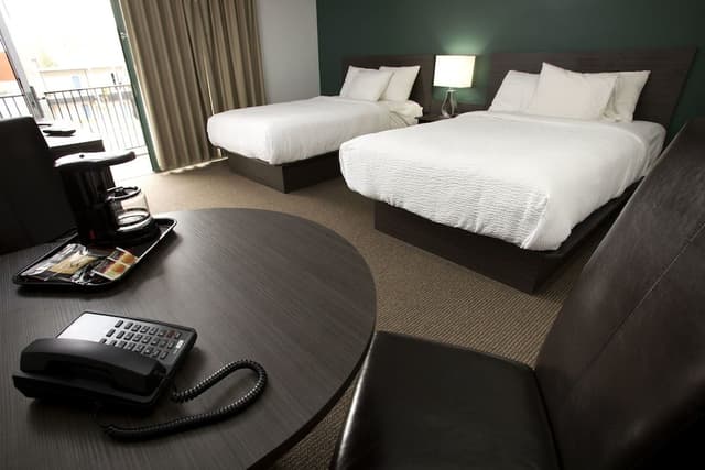 motel room with two double beds