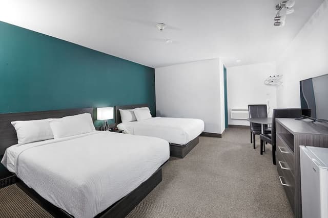 motel room with two double beds
