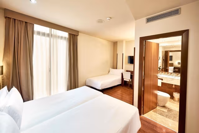 Triple Room (2 Adults + 1 Child)