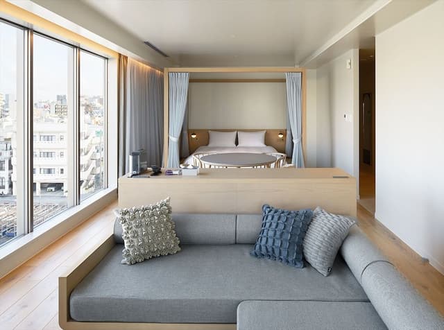Corner Suite (1 Queen bed with 2 sofa beds)