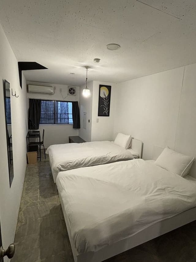 #05 Twin Room - Railroad Side (Shared Shower Room & Toilet)