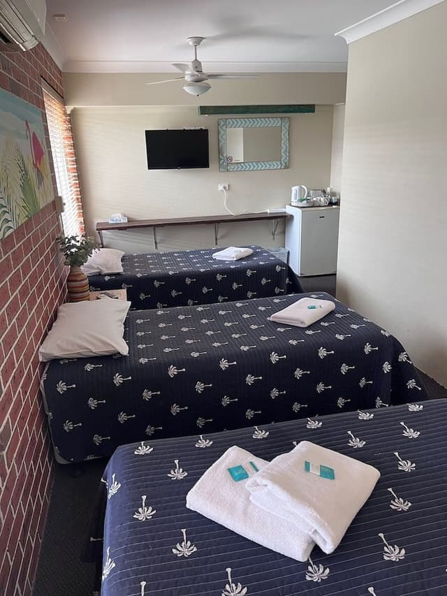 Room (1 Double & 3 Single Beds)
