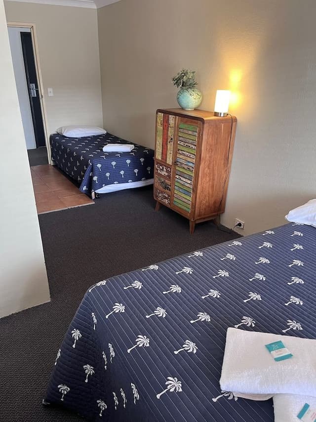 Room (1 Double & 3 Single Beds)