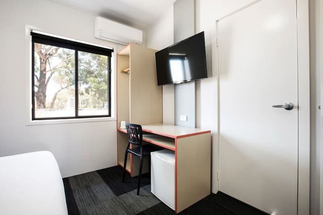Single room with shared bathroom