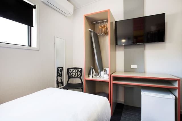 Single room with shared bathroom