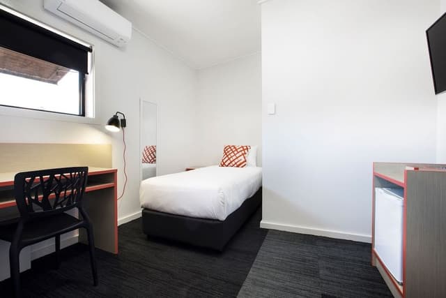 Single room with shared bathroom