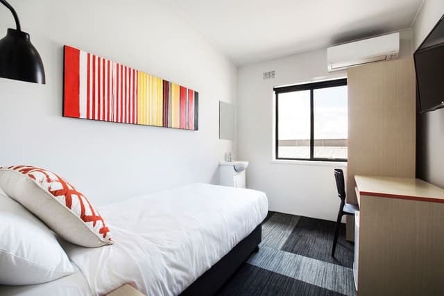 Single room with shared bathroom