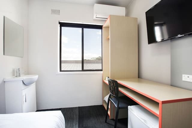 Single room with shared bathroom