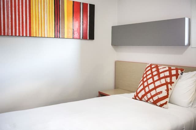 Single room with shared bathroom