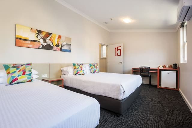 Economy Twin Queen with Shared Facilities