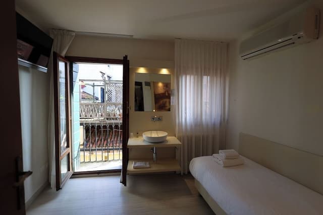 Single Room, Shared Bathroom