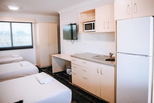 Family Room (Suite, 1 Queen Bed, 3 Single Beds)