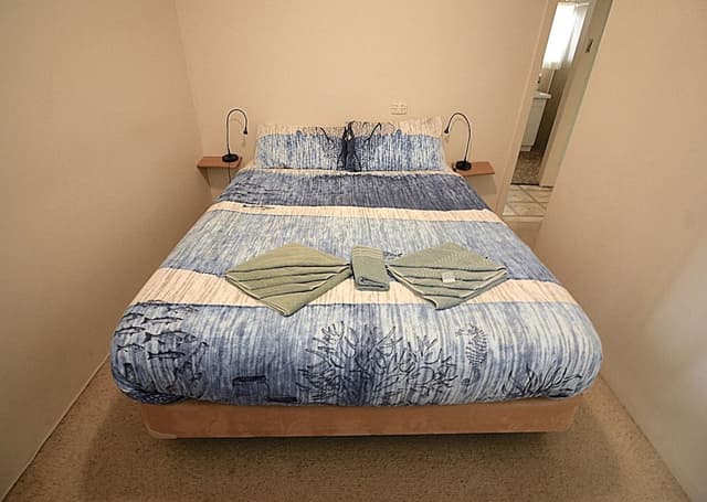 2 Bedroom Unit (1 Queen and 1 Triple Bunk Beds)