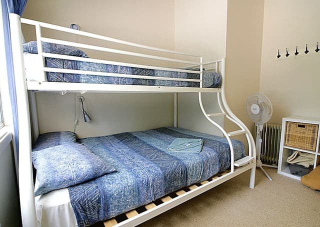 2 Bedroom Unit (1 Queen and 1 Triple Bunk Beds)