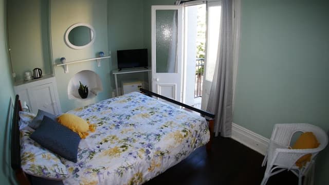Queen Room with Shared Bathroom and Juliet Balcony