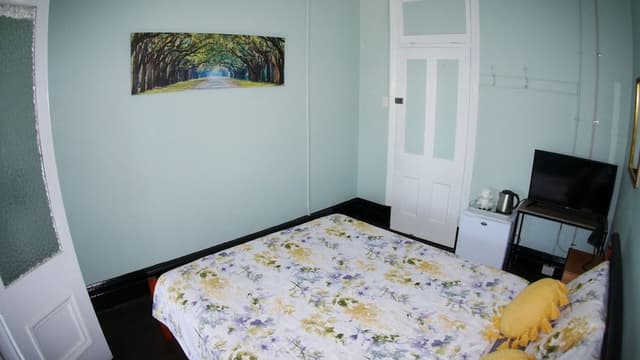 Queen Room with Shared Bathroom and Juliet Balcony