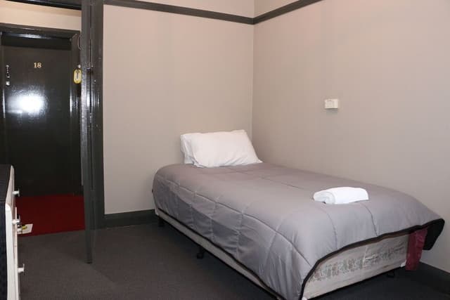Single Room, Shared Bathroom