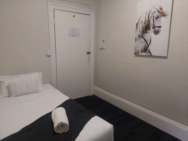 Single Room, Shared Bathroom