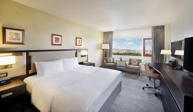 EXECUTIVE AMBASSADOR 1 KING AND 2 DOUBLE BEDS
