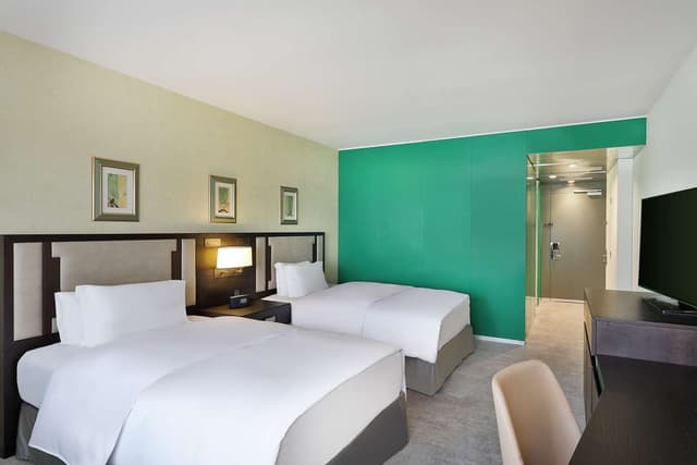 AMBASSADOR SUITE W/ 1 KING AND 2 DOUBLE BEDS