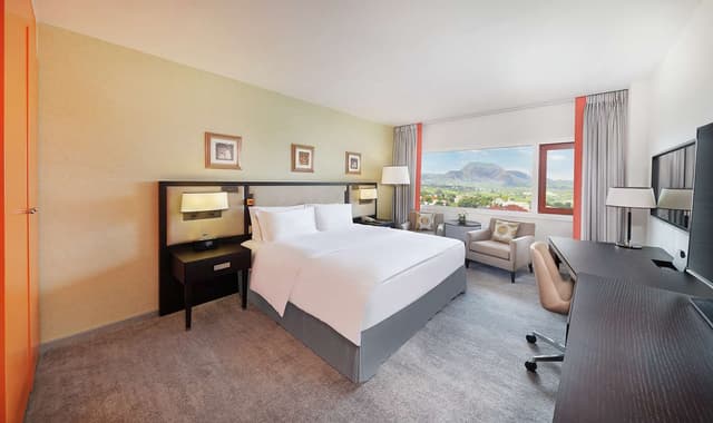 AMBASSADOR SUITE W/ 1 KING AND 2 DOUBLE BEDS