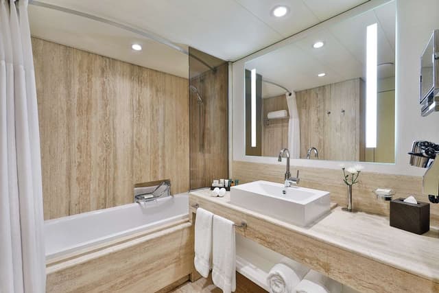 AMBASSADOR SUITE W/ 1 KING AND 2 DOUBLE BEDS