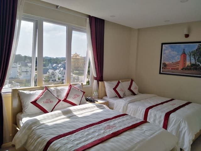 Deluxe Quadruple Room, City View