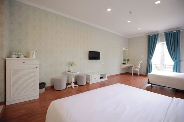 Deluxe Quadruple Room, 2 Queen Beds