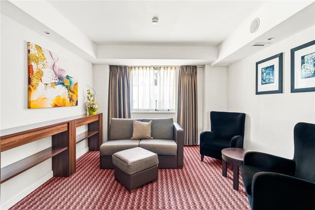 QUEEN DELUXE ROOM WITH SOFA BED - NS