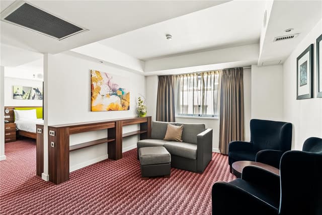 QUEEN DELUXE ROOM WITH SOFA BED - NS