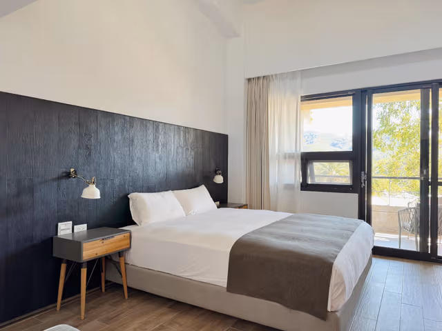 Deluxe Quadruple Room with Balcony