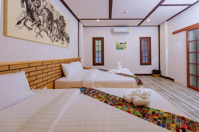 Deluxe Triple Room