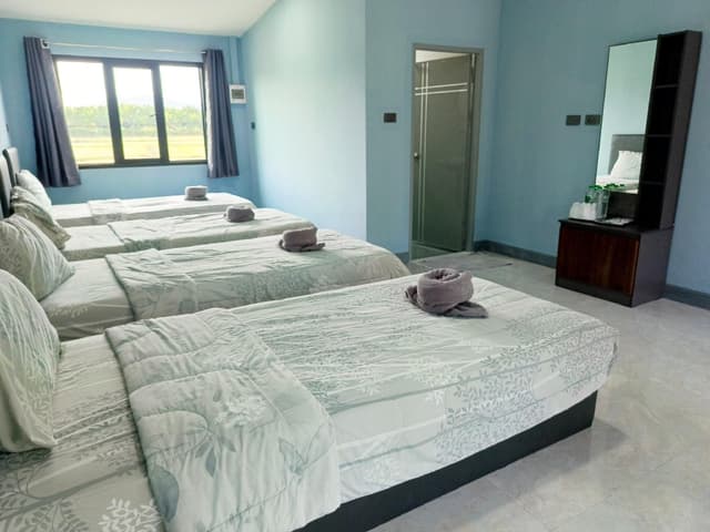 Room with 4 Beds, Air Conditioning and Balcony