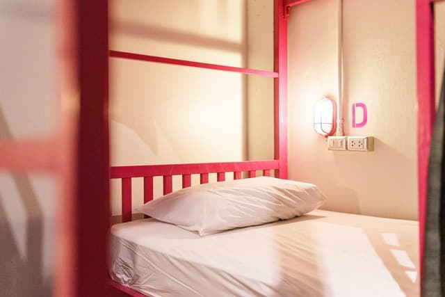 Bed in 6 Bed Mixed AC Dormitory Room with Shared Bathroom