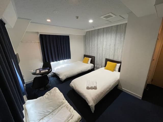 Triple Room, Non Smoking (2 Twin Beds and 1 Twin Sofa Bed)