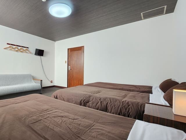 Triple Room, Non Smoking, Shared Bathroom