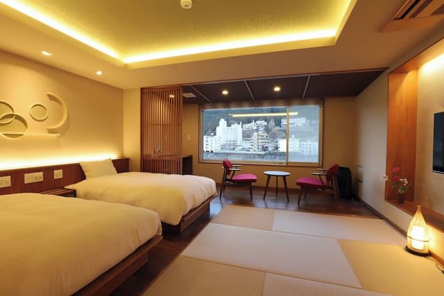 [Roshokan Japanese western style room] Twin bed with Futon & Hot spring bath