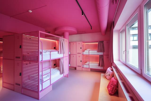 Single bed in female dormitory room
